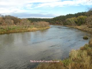 Niobrara River from walking bridge with Smith Falls Park campgrounds and picnic areas